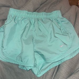 NIKE RUNNING SHORTS SIZE SMALL BLUE